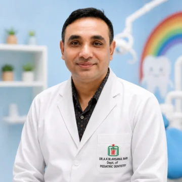 Lt Col Dr A. K. M. Ahsanul Bari, paediatric dentist in Dhaka, wearing a white dental coat in a child-friendly dental clinic.
